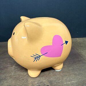 Piggy bank with heart and arrow design 5.5” long
